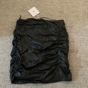 Leather skirt , new, small slit